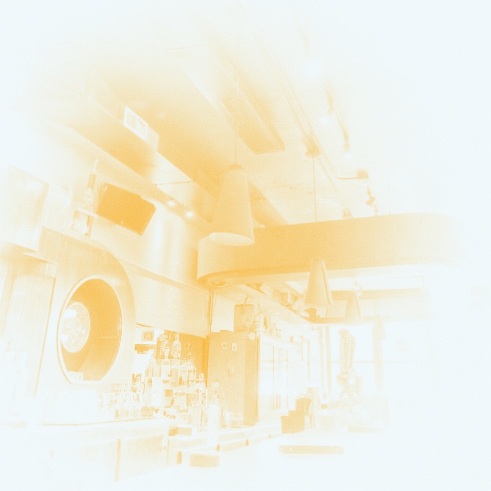 The album artwork for $5 Whiskey Sours, by Smallhounds. A duotoned photograph of the back of a local bar, with the bar colored in a bright gold against a white background.